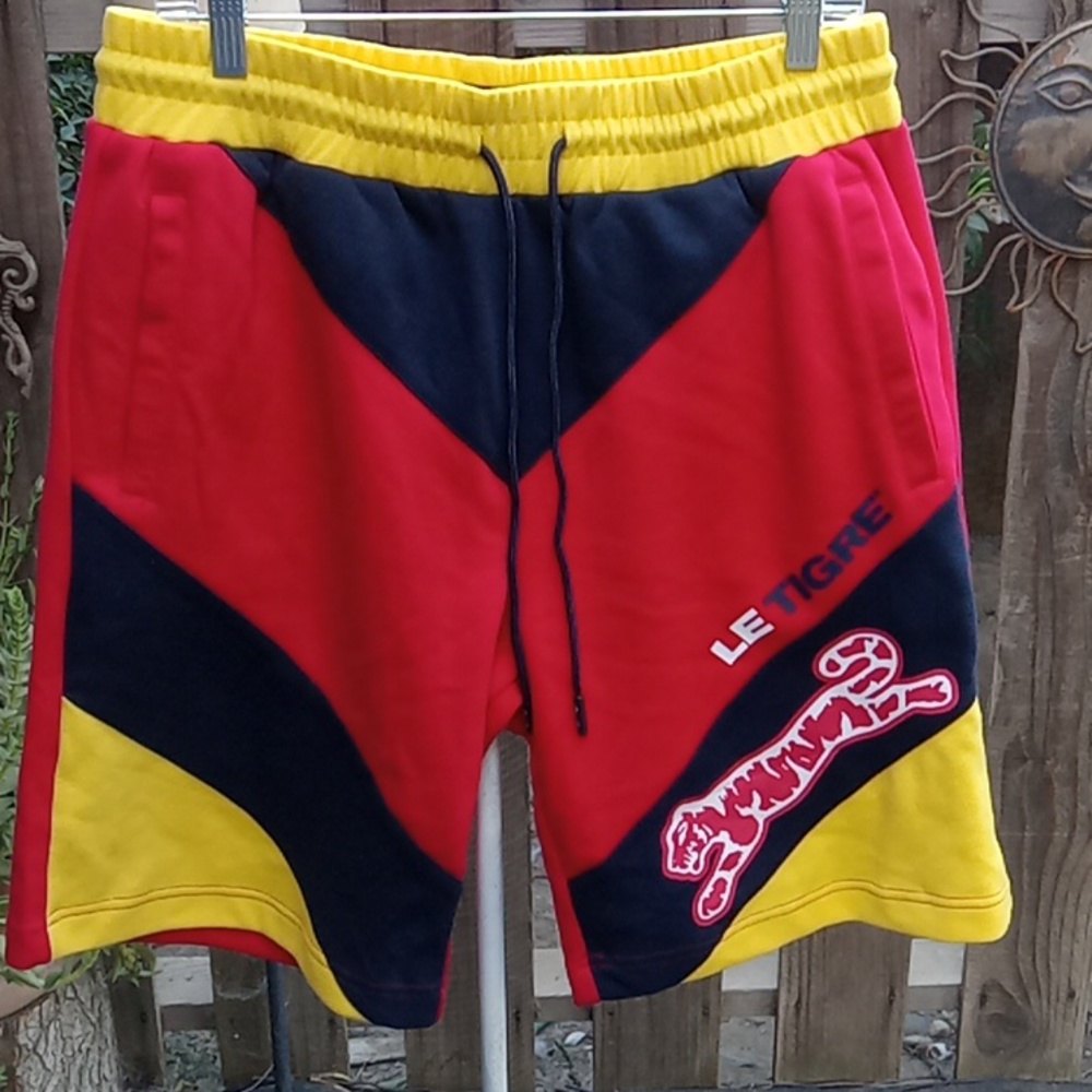 Men's size large new with tags very colorful brand Le Tigre